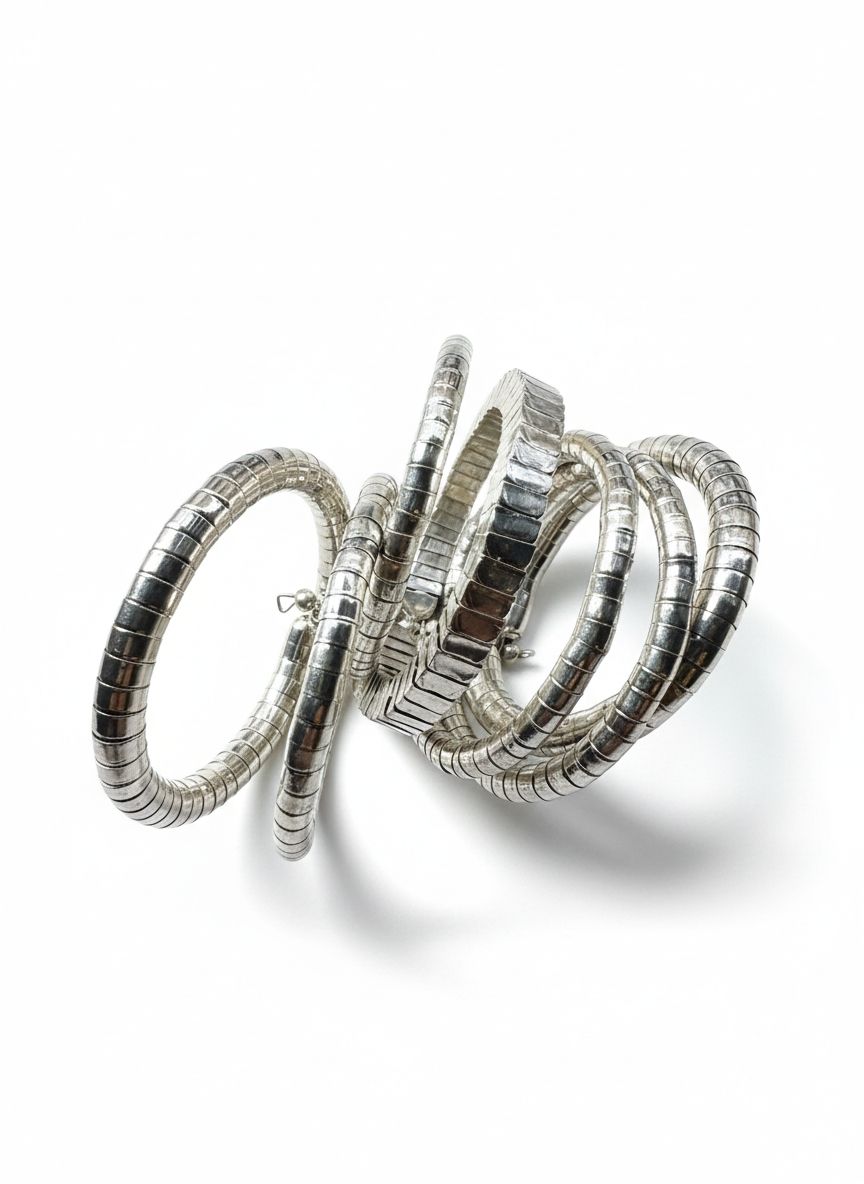 Brazalete 7 esclavas bronce acabado plateado