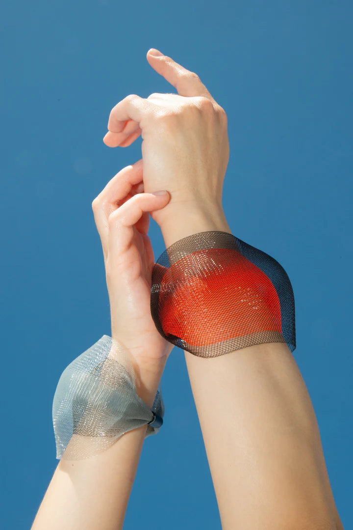 Brazalete red invisible naranja