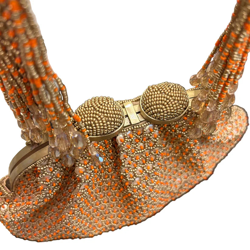 Clutch estilo vintage bordado en lentejuelas oro y naranja