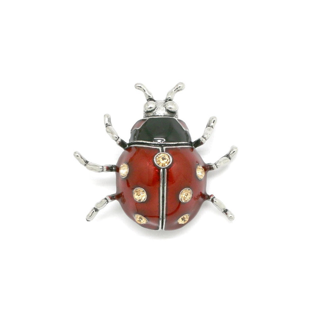 Broche metálico "mariquita" efecto vintage