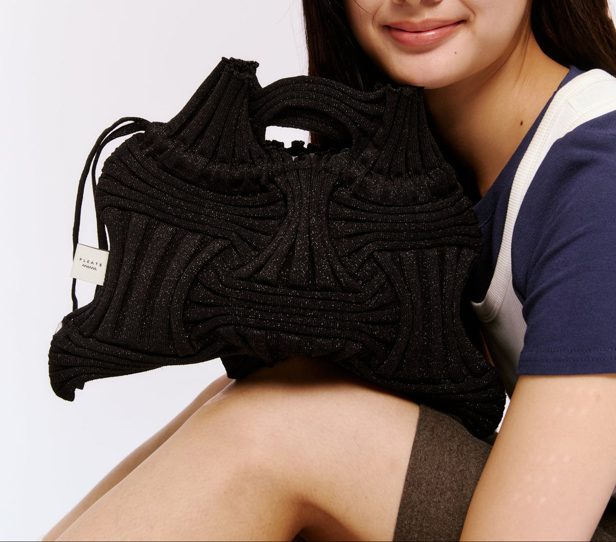 Bolso de mano de punto lúrex color negro