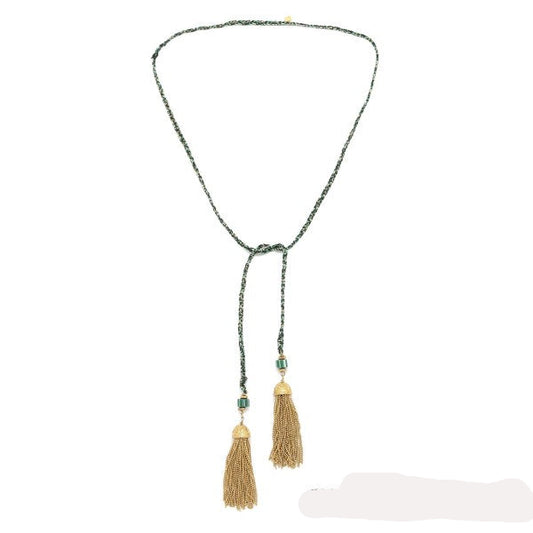 Sautoir cintilla verde con borlas doradas